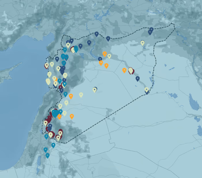 Map showing Syria and surrounding areas with multicolored pins marking locations within dotted boundary lines.