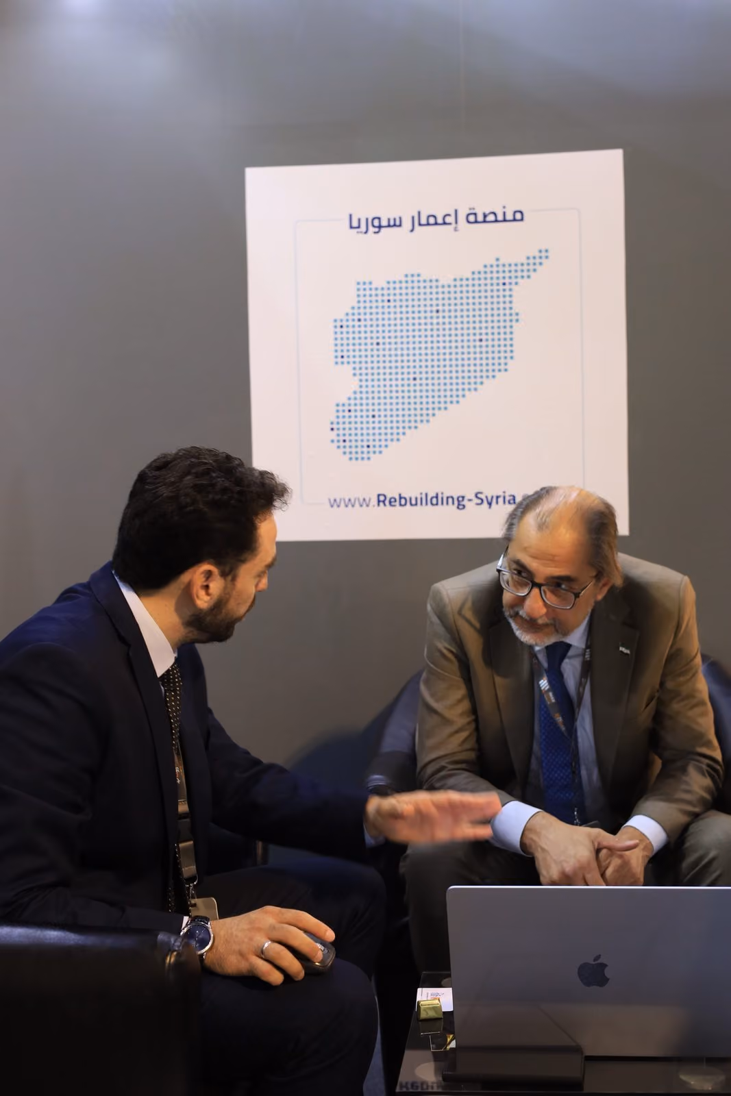 A meeting at the Rebuilding Syria Platform stand
